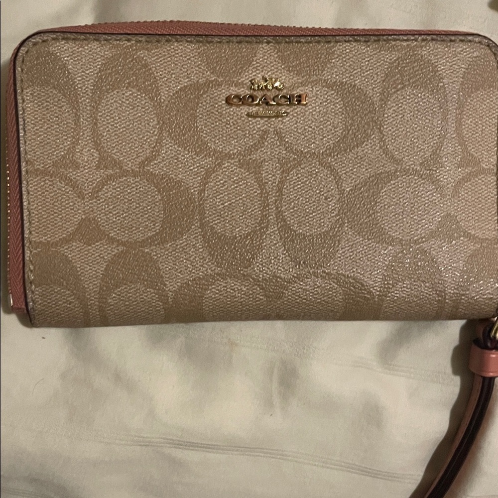 Coach Beige and Pink Wristlet used but in great condition